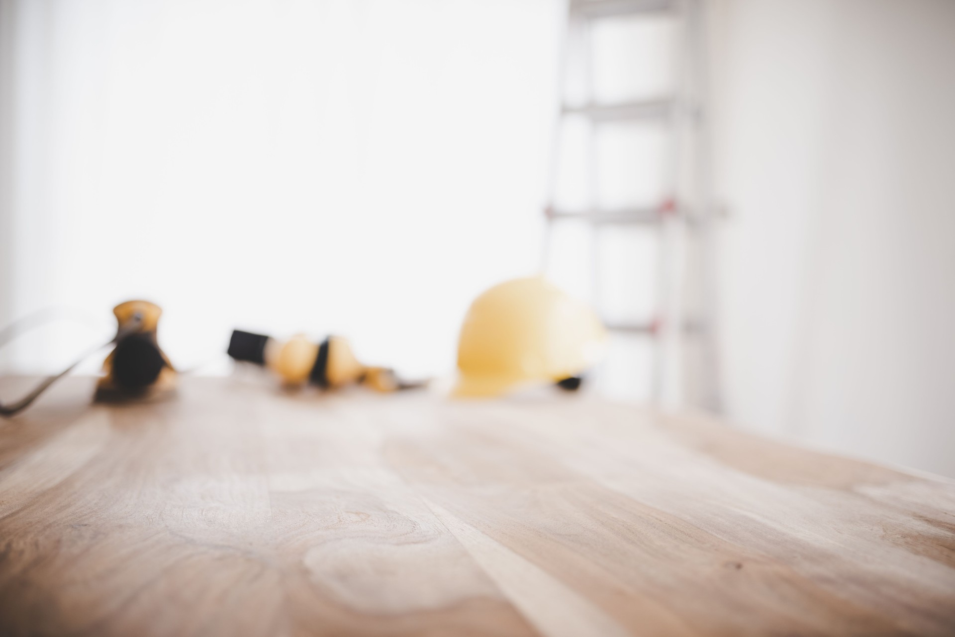 Construction  tools on a wooden table